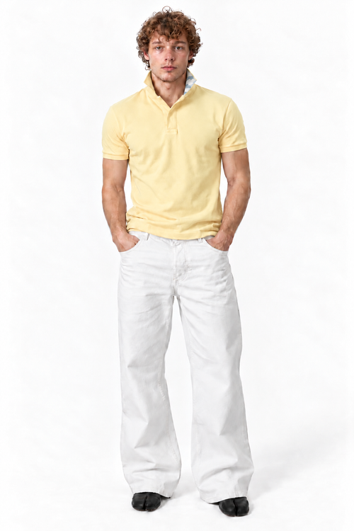 Yellow polo worn by model